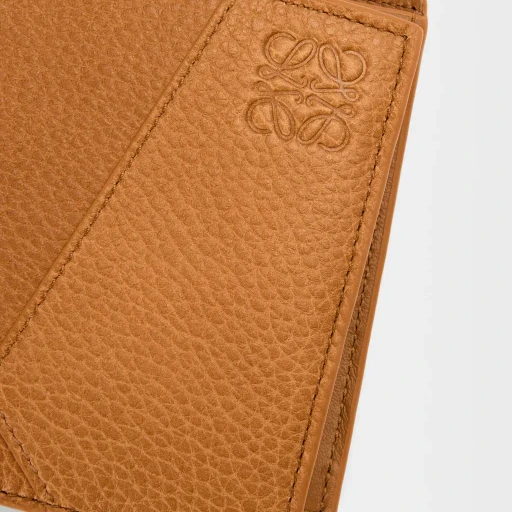 Puzzle Bifold Coin Wallet In Supple Grained Calfskin