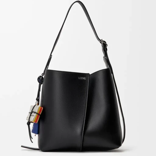Newspaper Charm In Calfskin