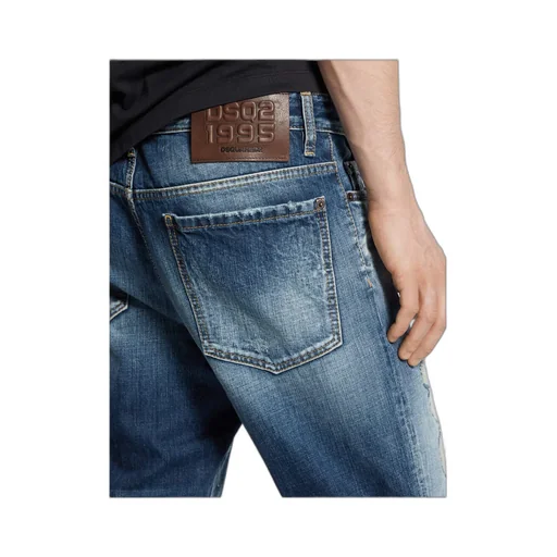 Distressed Tapered Jeans
