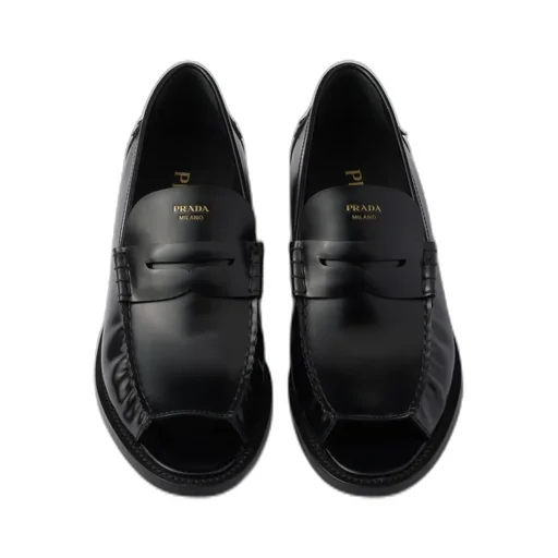 Prada Logo-Printed Penny Loafers