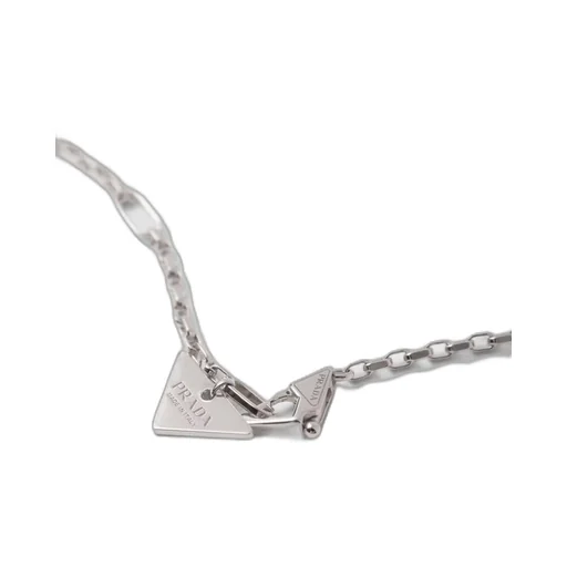 Eternal Gold micro triangle pendant necklace in white gold and diamonds