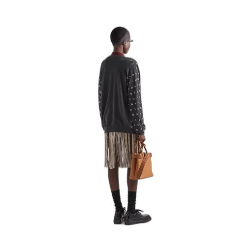 Cashmere cardigan with grommets