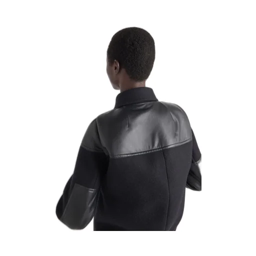 Single-breasted cloth and leather coat