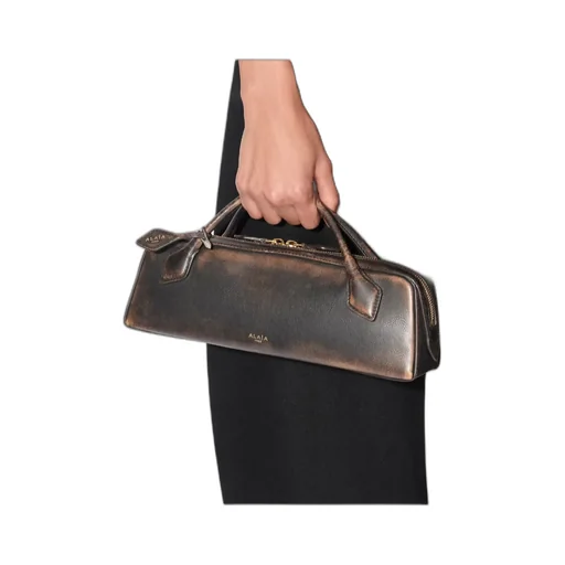 Le Teckel Clutch In Aged Leather