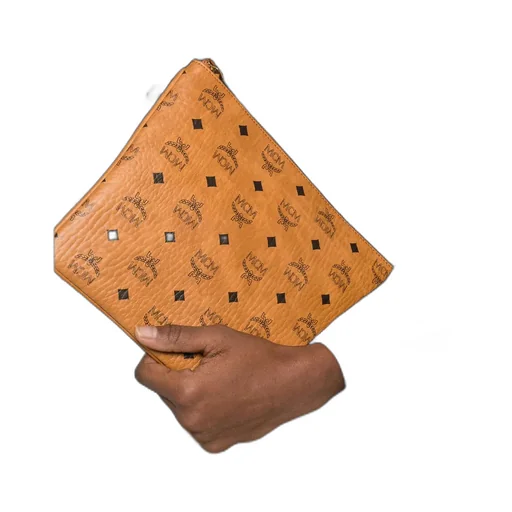 Mcm Logo Patterned Zipped Clutch Bag