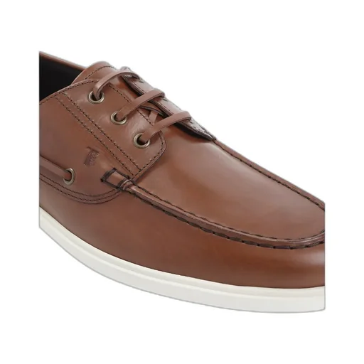 Tod's Logo Embossed Laced Boat Shoes