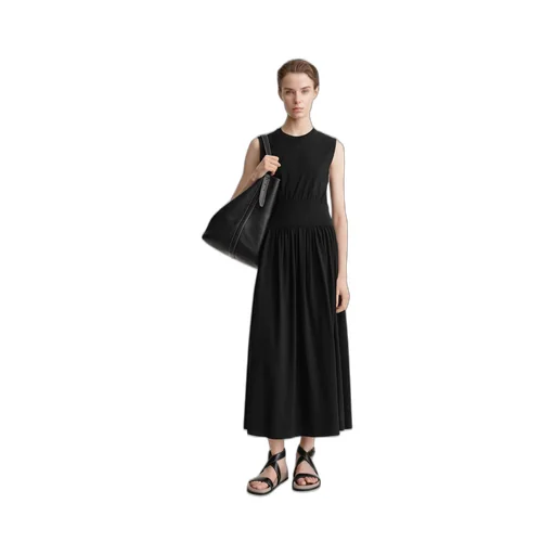 A Sleeveless Pleated Dress