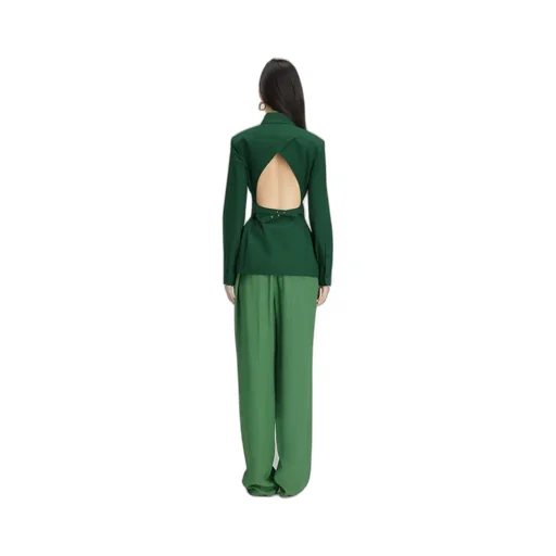 A Shirt With A Pointed Collar And A Bare Back