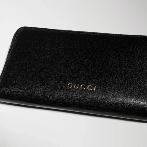 Zip Around Wallet With Gucci Lettering