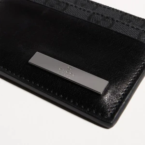 Card Case With Metal Tag