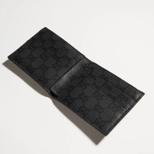 Bi-Fold Wallet With Metal Tag
