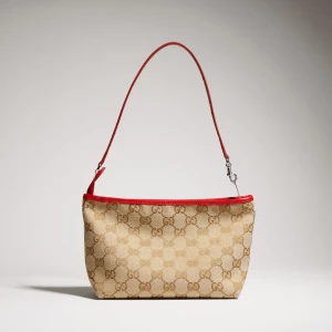Small Pouch With Strap And Gucci Plaque