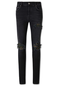 Amiri Distressed Skinny Jeans