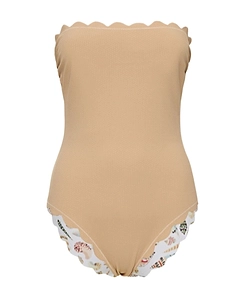 Esapeake Wears A One-Piece Swimsuit On Both Sides